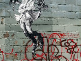 01-1132-graffiti-brooklyn-NY-pasteup-man-flying.jpg