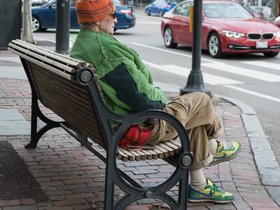 10-1825-woman-street-bench.jpg
